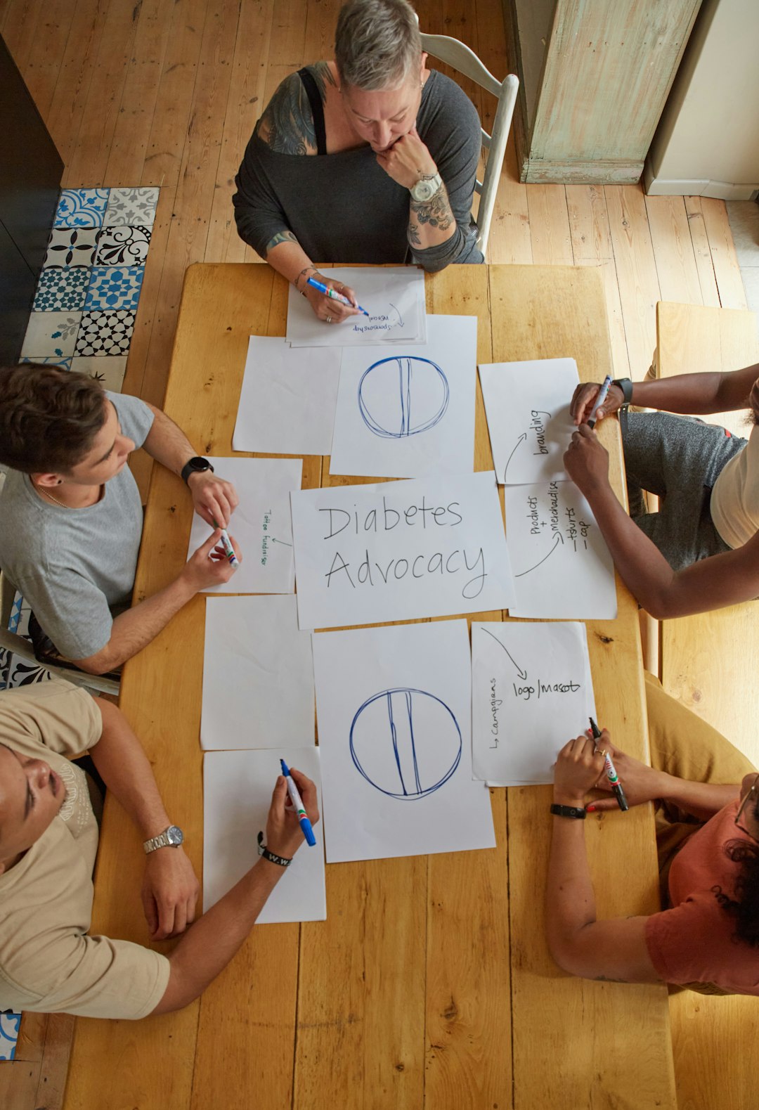 people-are-collaborating-on-a-diabetes-advocacy-project-ja9inzmbzkg